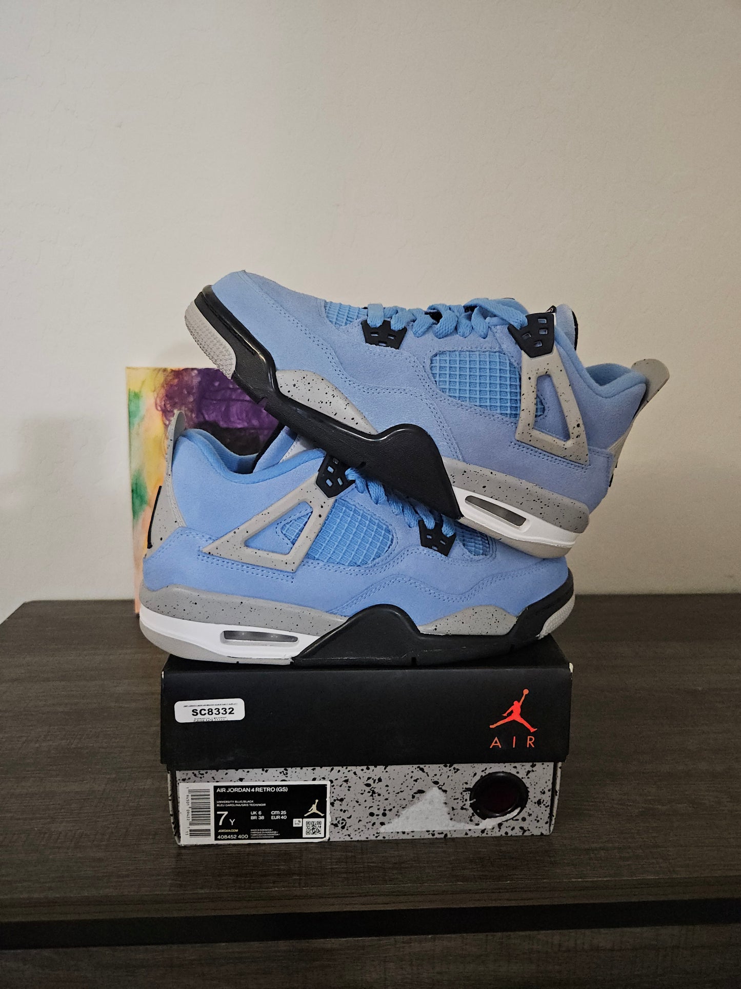 Size 7y - Youth University Blue Jordan 4's
