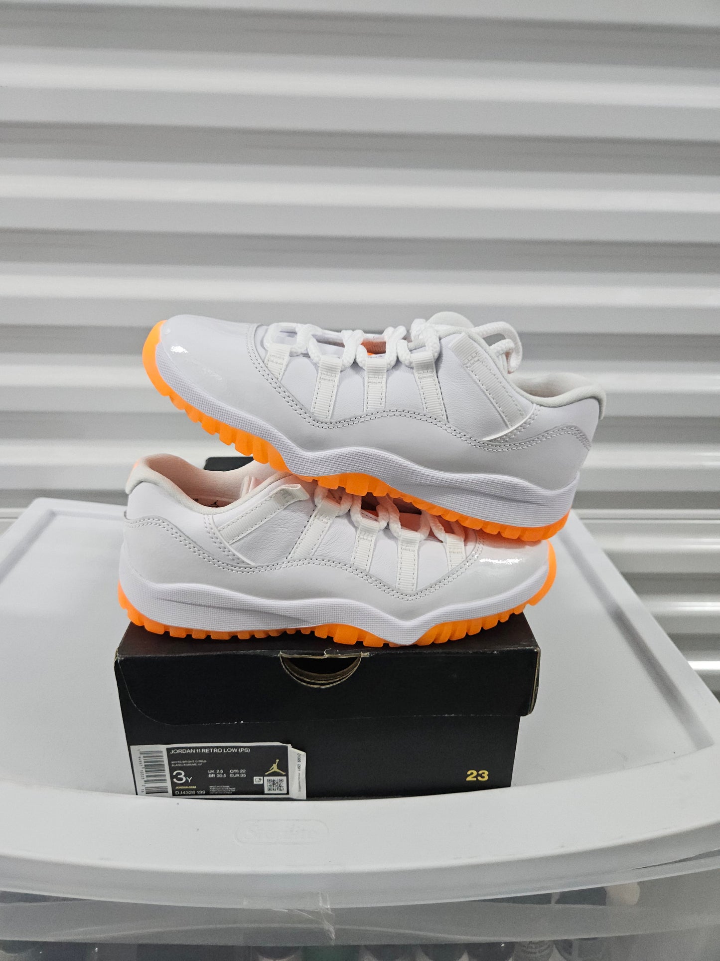 Size 3y - Citrus Jordan 11's